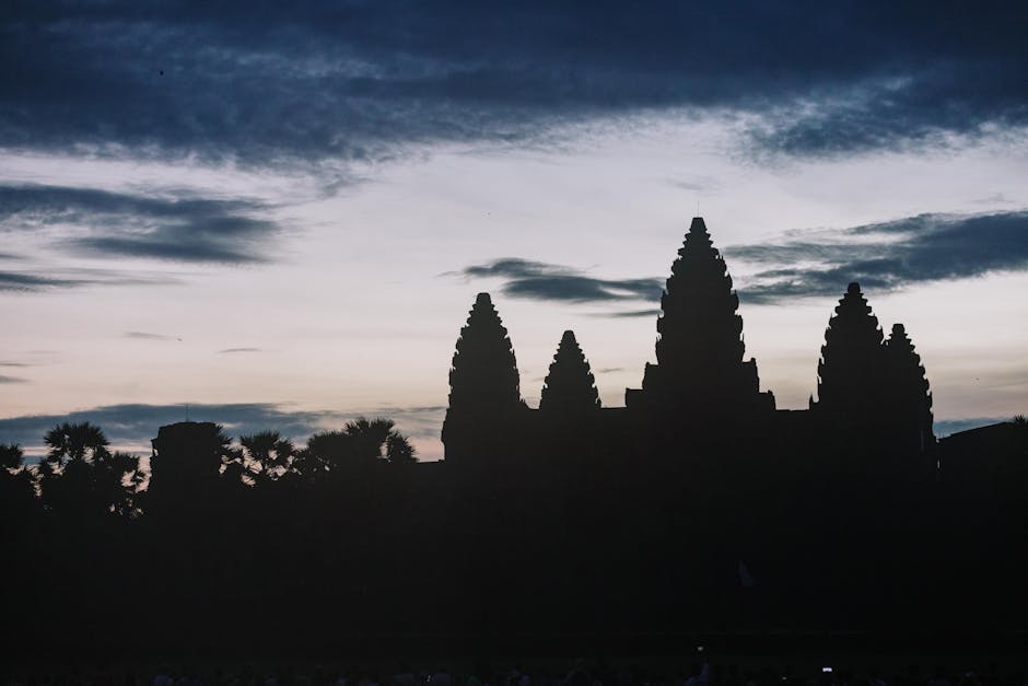 Intricate stone carvings and corridors inside an Angkor temple