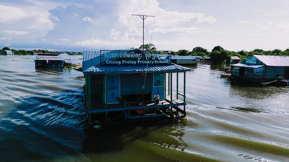 Colourful floating houses and boats on the vast Tonle Sap lake
