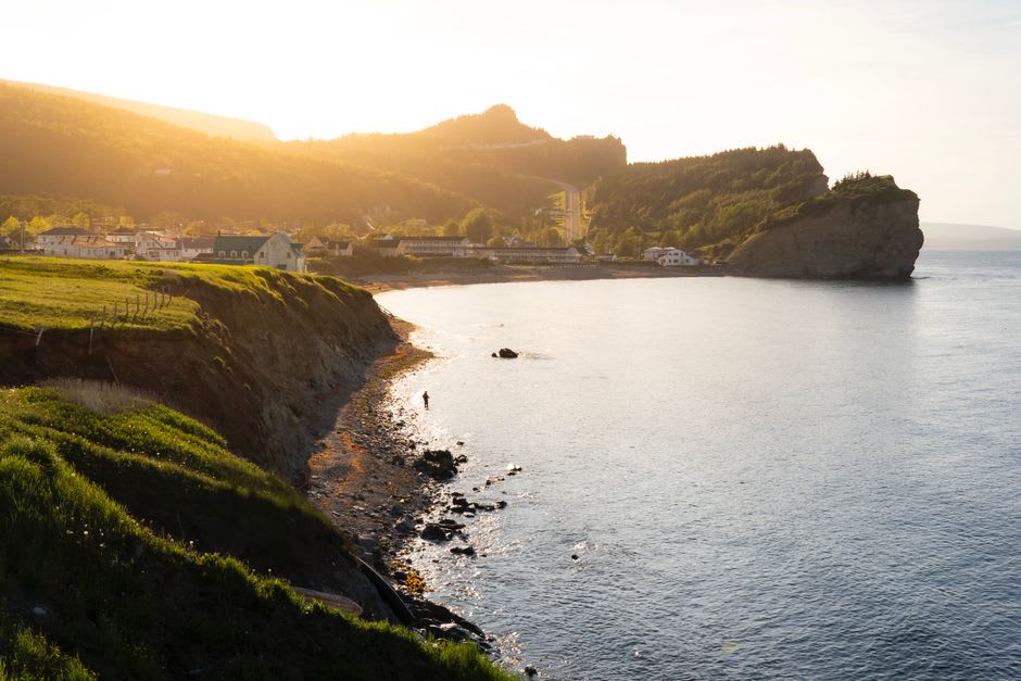 Percé Rock illuminated at sunset off the Gaspé coastline