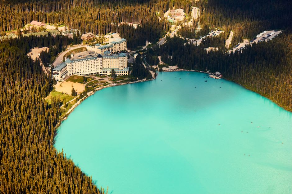 The Fairmont Chateau Lake Louise viewed from across the turquoise lake