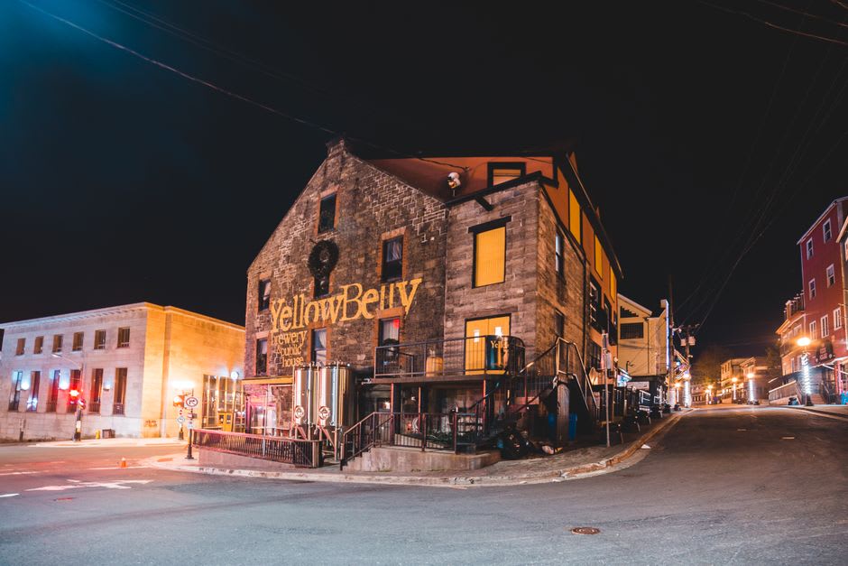George Street in St. John's lit up with pubs and crowds on a summer night
