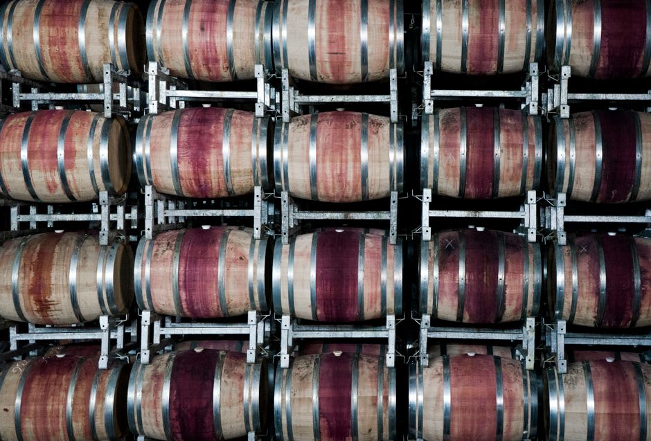 Rows of oak barrels inside the KWV Worcester Brandy Cellar
