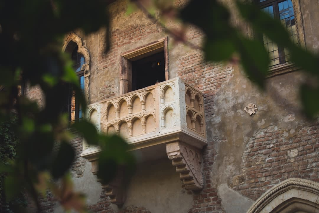 The stone facade and veranda of Pedro St. James Castle in warm afternoon light