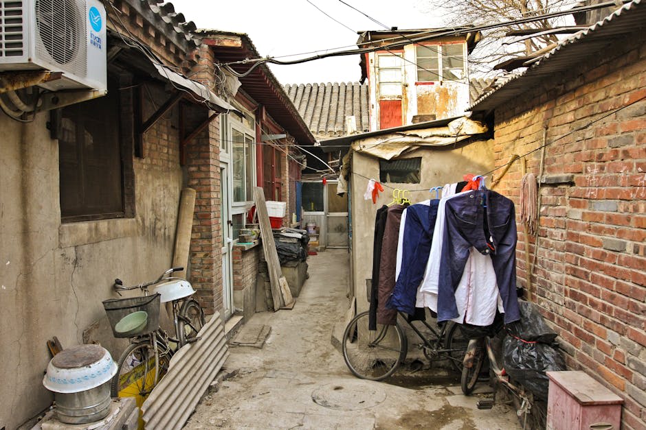 Traditional Beijing hutong alleyway with local life