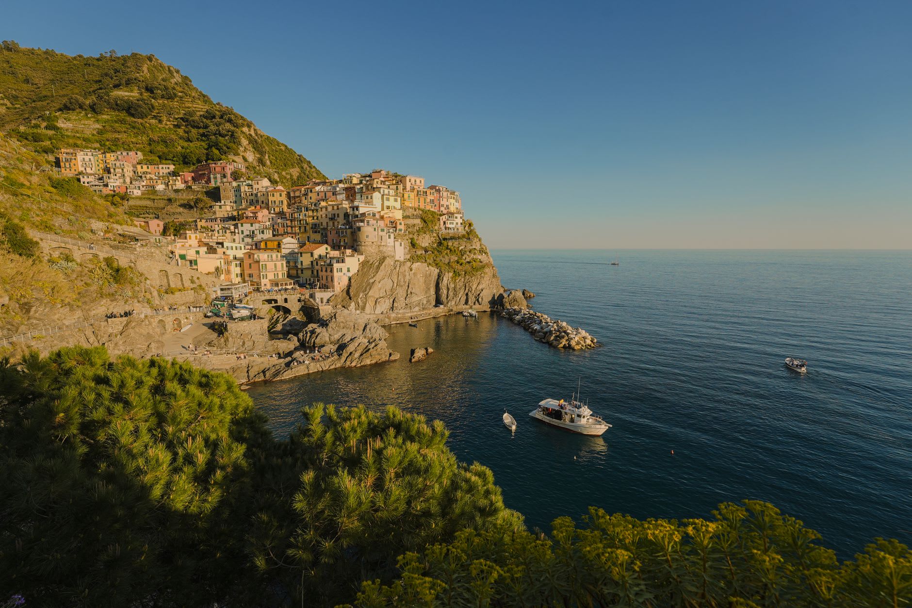 The steep terraced pilgrim path climbing from Riomaggiore toward the Sanctuary of Montenero through vineyards and scrub