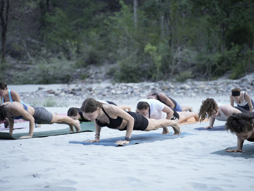 Yoga practitioners on a tropical terrace overlooking the ocean