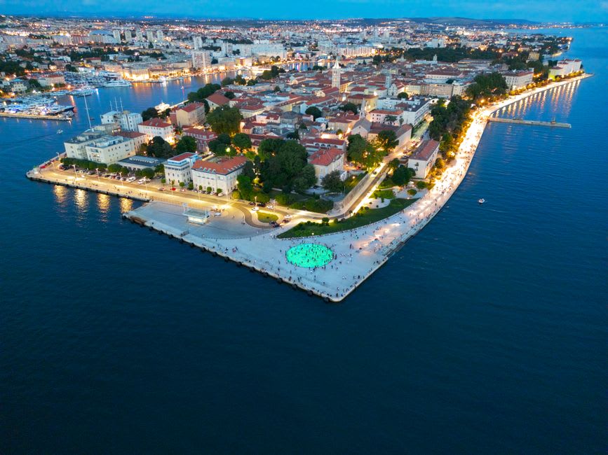 Sunset light over the Adriatic seen from the Sea Organ steps in Zadar
