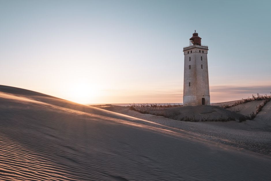 Anholt's historic 1788 lighthouse standing against the Kattegat coastline