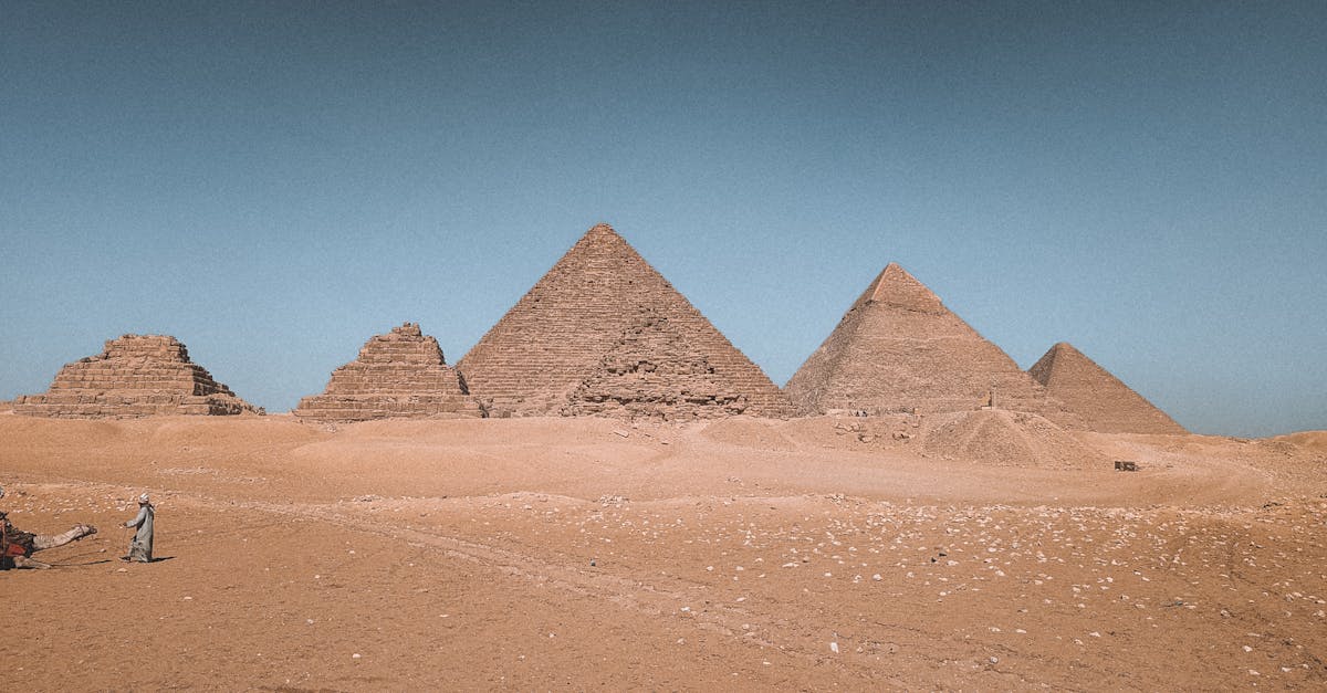 The Great Pyramids of Giza against a desert sky