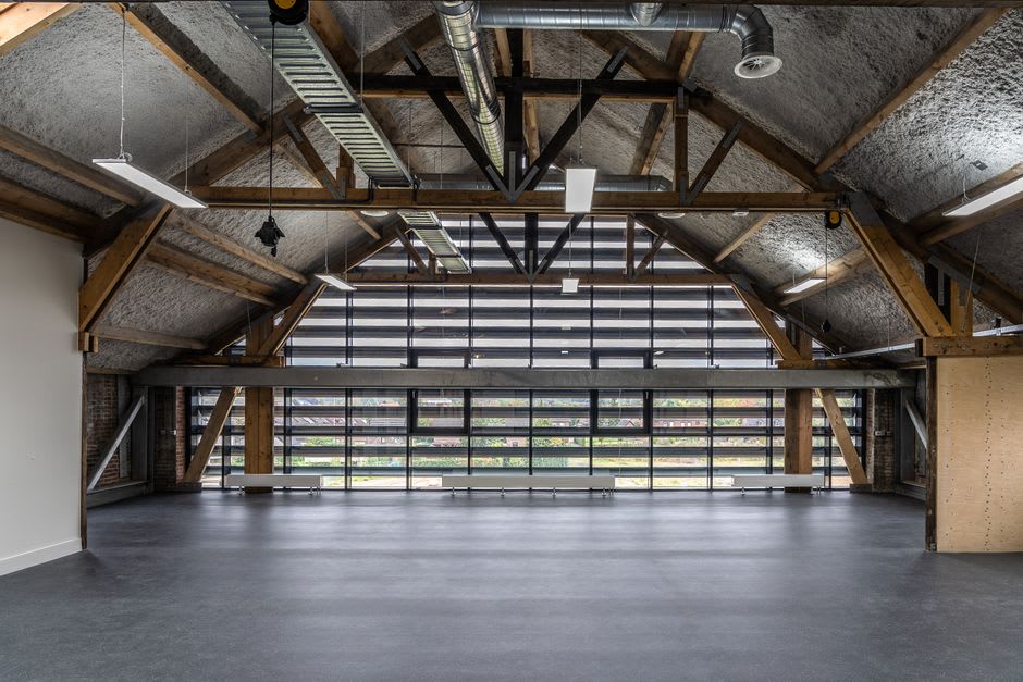 One of the enormous salt-evaporation workshops inside the Saline Royale, its timber roof structure exposed above the empty hall