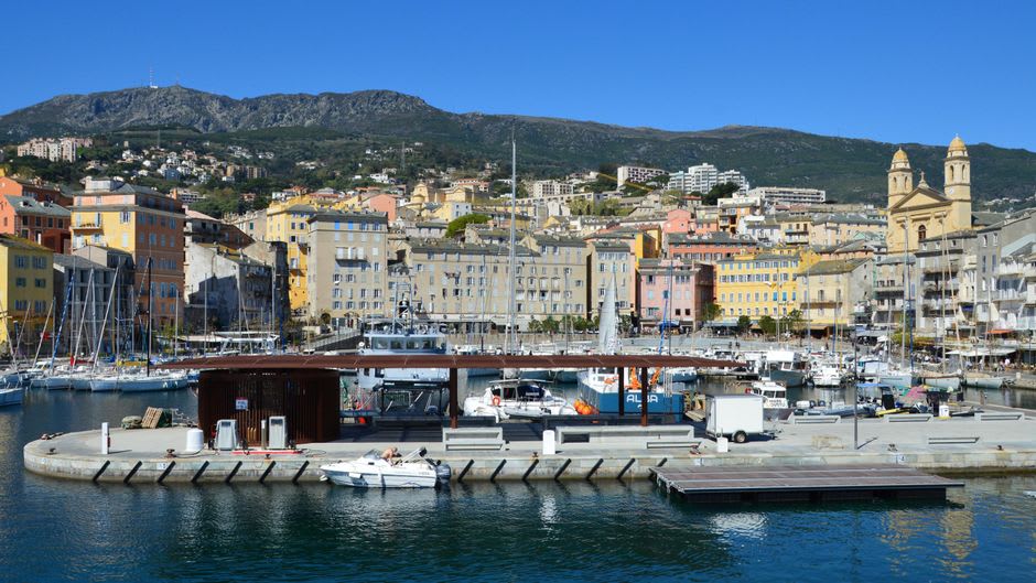 The narrow, stacked stone streets of Bastia's Terra Vecchia quarter climbing toward the citadel