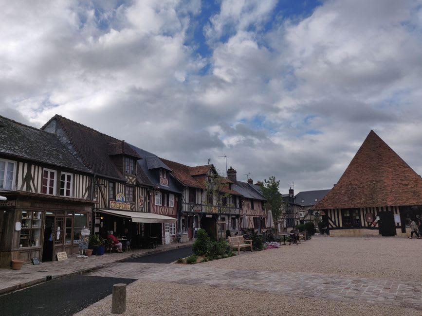 A quiet cobbled street in Beaugency's old quarter lined with half-timbered medieval houses
