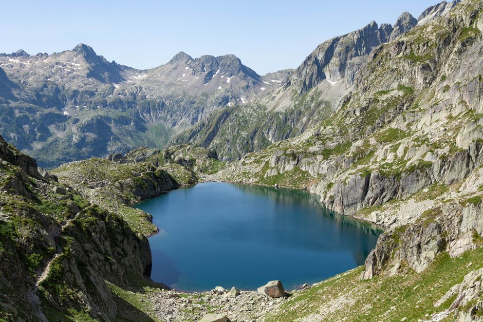 The turquoise glacial waters of Lac de Gaube beneath the Vignemale massif above Cauterets