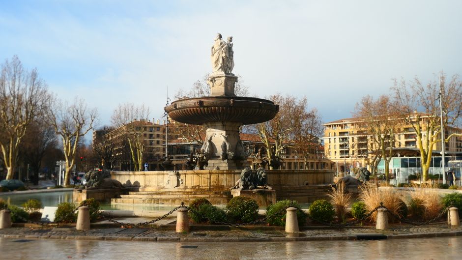 The Fontaine des Éléphants, four elephant statues supporting a column, in a roundabout in central Chambéry