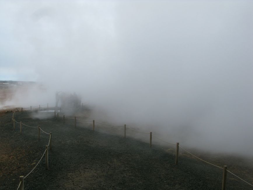 Steam rising from the Source du Par thermal spring in the center of Chaudes-Aigues