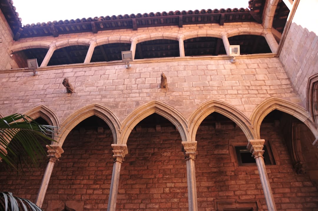 The stone-roofed covered market hall in the center of Domme's grid-planned bastide streets