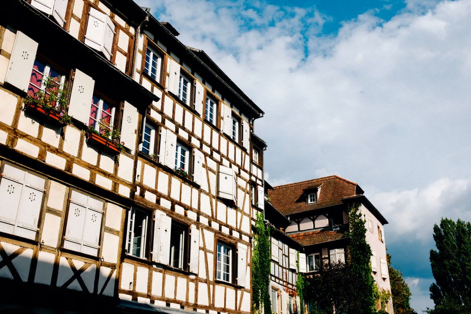 A narrow street with half-timbered houses in the Marchix quarter below Château de Fougères