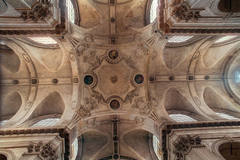 The vividly painted zodiac fresco cycle on the vaulted ceiling above the choir of the Abbatiale Saint-Austremoine