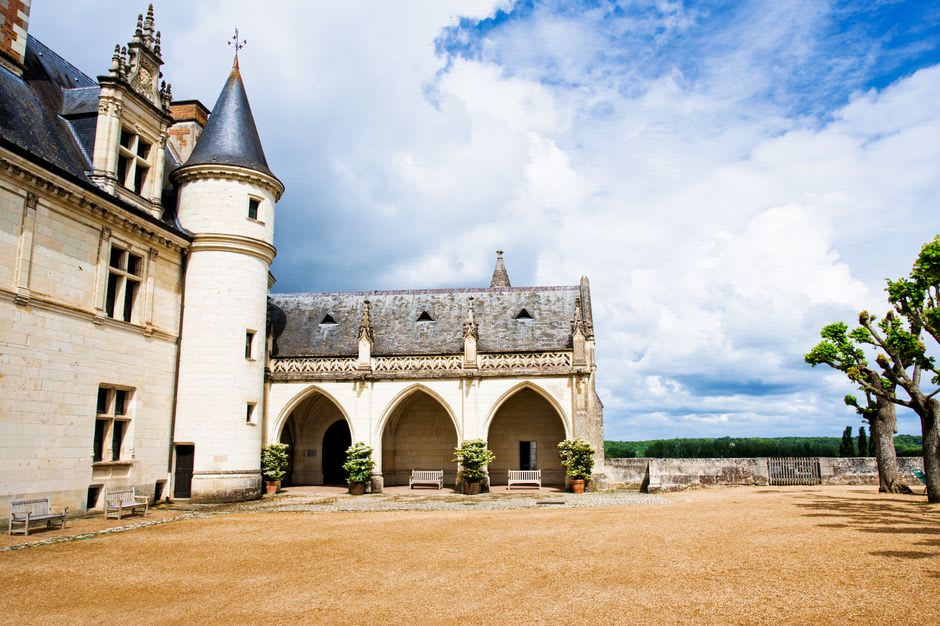 The ornate Gothic dormer windows and turrets on the courtyard-facing side of Château de Josselin