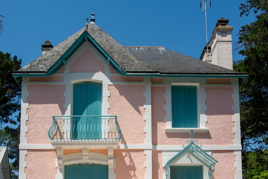 Belle Époque villas with turrets and balconies lining the seafront promenade of La Baule