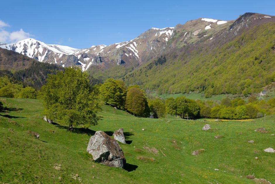 The green Charlannes plateau above La Bourboule with views across the valley toward the Sancy massif