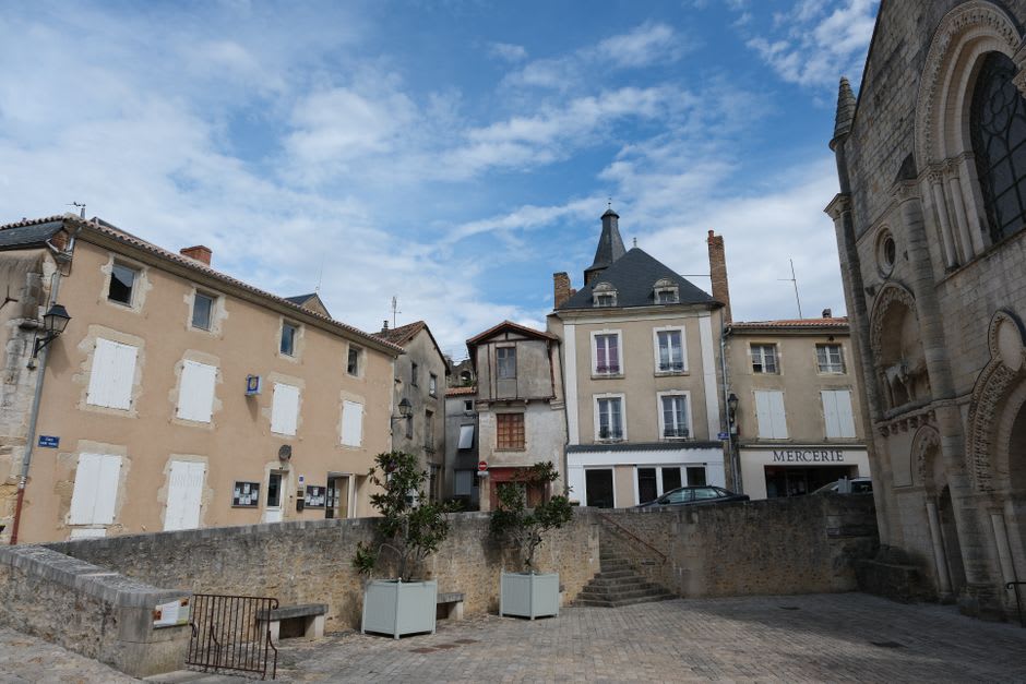 Statue of Diderot in a stone square in Langres near the cathedral