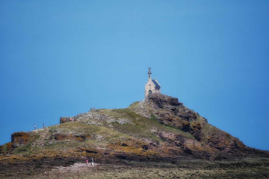 The Chapelle Saint-Michel d'Aiguilhe perched on its narrow volcanic rock spire above Le Puy-en-Velay