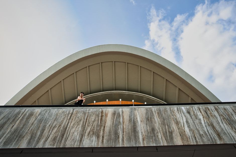 The undulating wooden roof of the Centre Pompidou-Metz against the evening sky