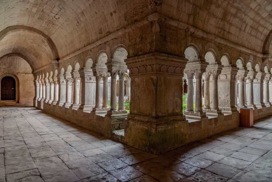 The stone cloister and arched gallery of the Abbaye de Fontenay near Montbard