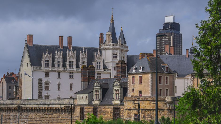 The stone towers of the Château des Ducs de Bourbon rising above the rooftops of old Montluçon
