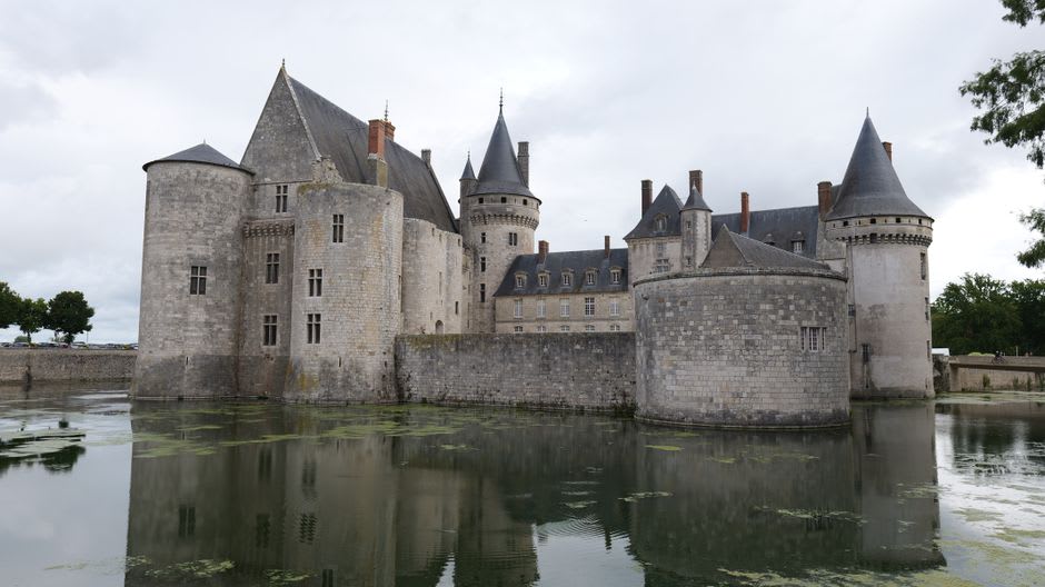 The Serein river looping around the fortified walls and towers of Noyers-sur-Serein