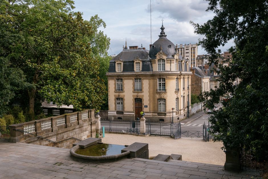 The formal terraced gardens of the Parc du Thabor in Rennes with clipped hedges and flower beds