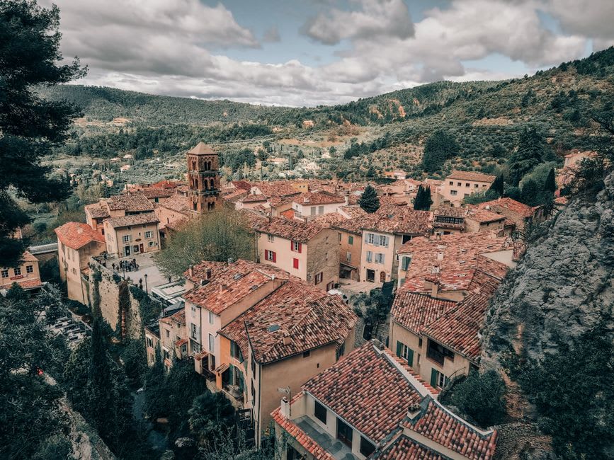 The stone keep of Roquebrune's medieval château rising above the tiled rooftops of the old village