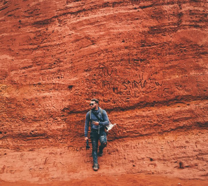 Reddish-orange ochre pinnacles and eroded cliffs along the Sentier des Ocres walking trail near Roussillon