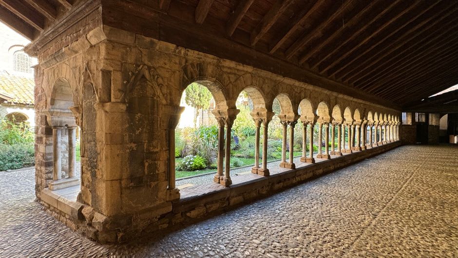 The stone cloister garden with olive trees at the former Saint-Paul-de-Mausole asylum in Saint-Rémy-de-Provence
