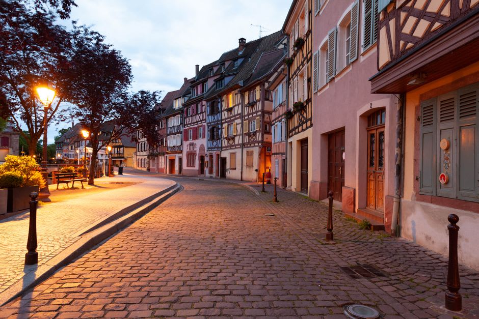 A quiet street of half-timbered Lorraine-style houses in Sarrebourg's old town at early evening