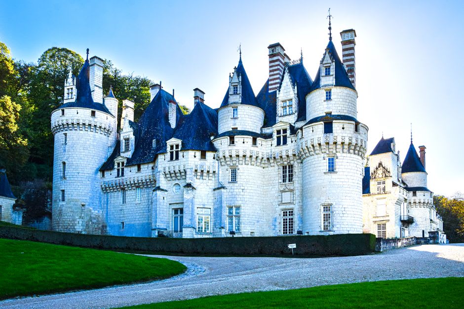 One of the turret rooms at Château d'Ussé staged with wax figures recreating a scene from Sleeping Beauty