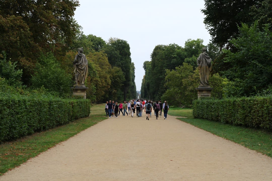The long formal garden axis of Vaux-le-Vicomte stretching from the château toward statues on the horizon