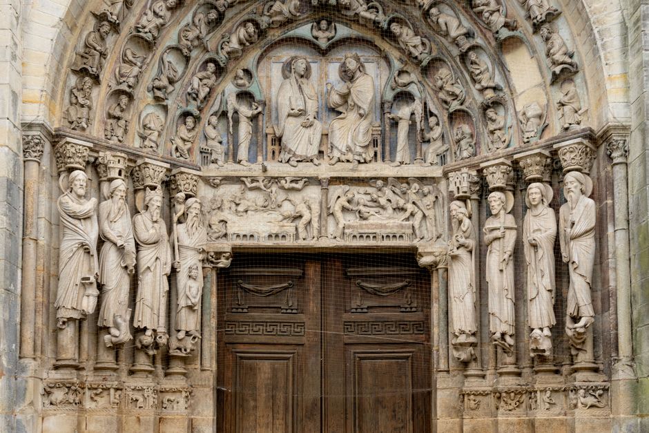 The elaborately carved Romanesque tympanum above the main door of the Basilique Sainte-Marie-Madeleine in Vézelay