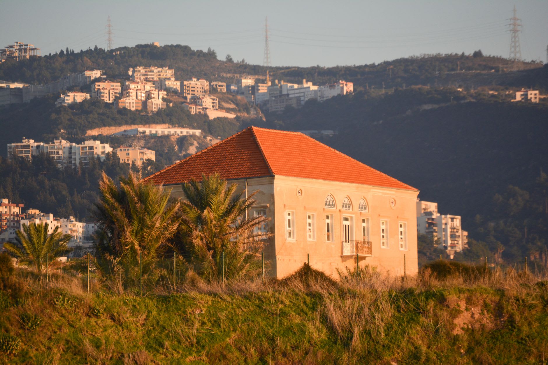 Morning mist over the Sea of Galilee seen from the garden terraces of the Mount of Beatitudes