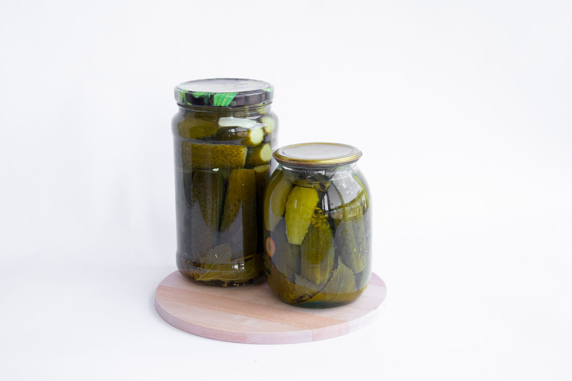 Jars of traditional Spreewald pickles with dill and mustard seed at a local market stall