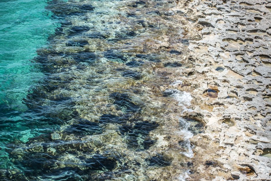 Los bajíos turquesa de Agincourt Reef dando paso a agua azul profunda en el borde de la plataforma continental