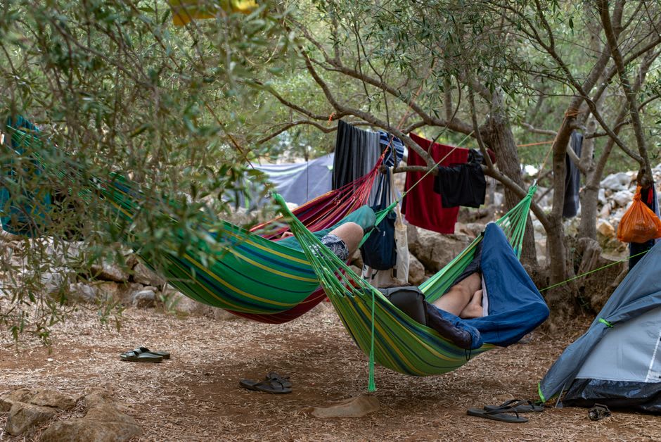Campsite hammocks strung between trees near the ancient ruins deep in the Petén jungle