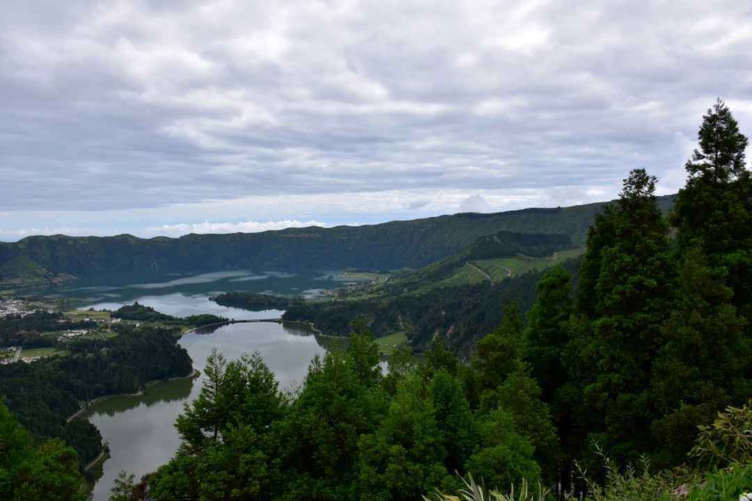 Aerial view of Lago de Amatitlán from the cable car with green hills and volcanic peaks