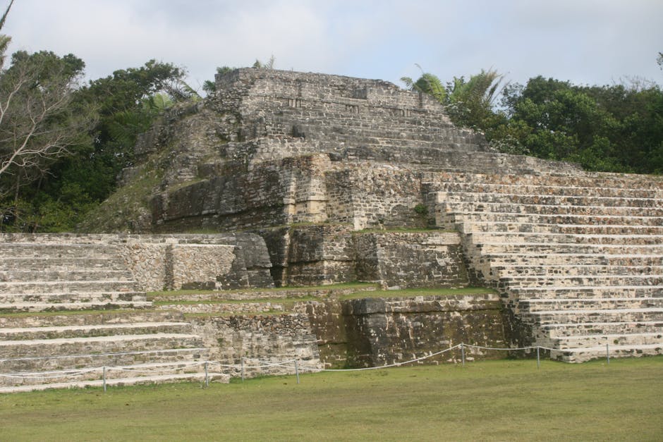 The Gran Plaza of Tikal with temples flanking a ceremonial courtyard surrounded by jungle