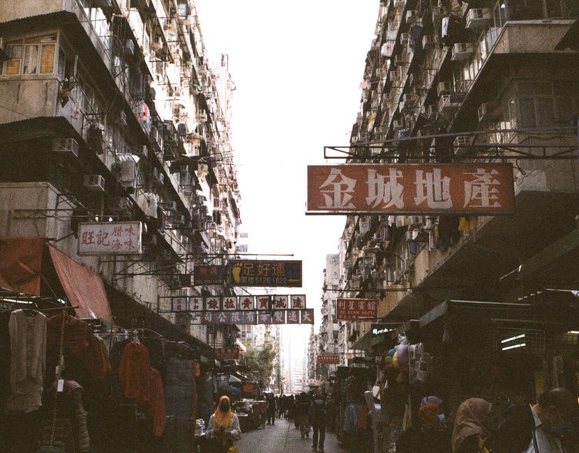 Fish and seafood stalls with vendors arranging the morning catch inside Tai Po Hui Market