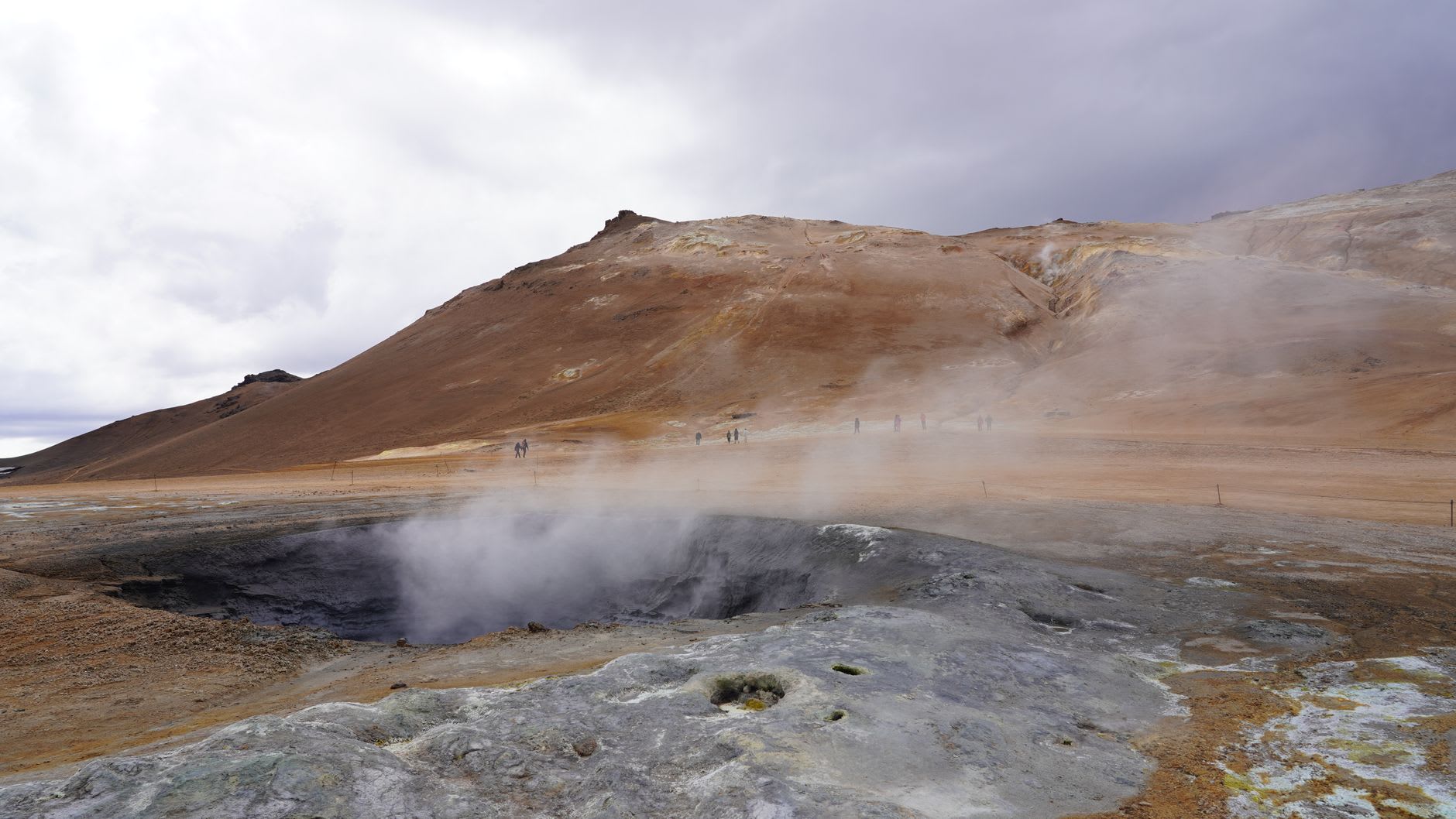Grass-topped pseudocraters dotting the shore of Lake Mývatn in the golden northern light