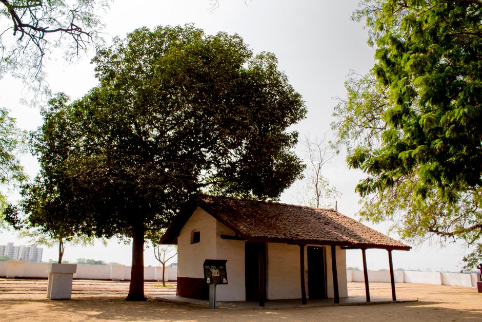 Gandhi's simple preserved living quarters at Sabarmati Ashram beside the river