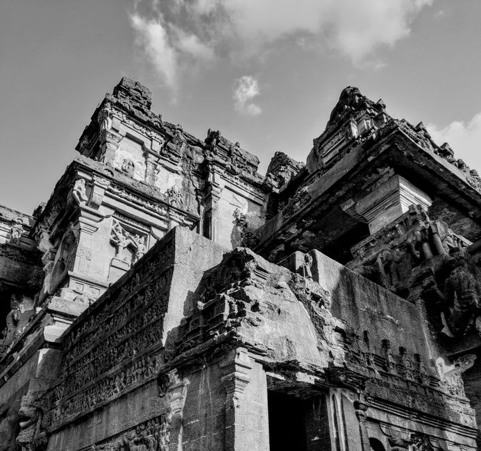The multi-story Kailasa Temple at Ellora carved directly out of a basalt cliff