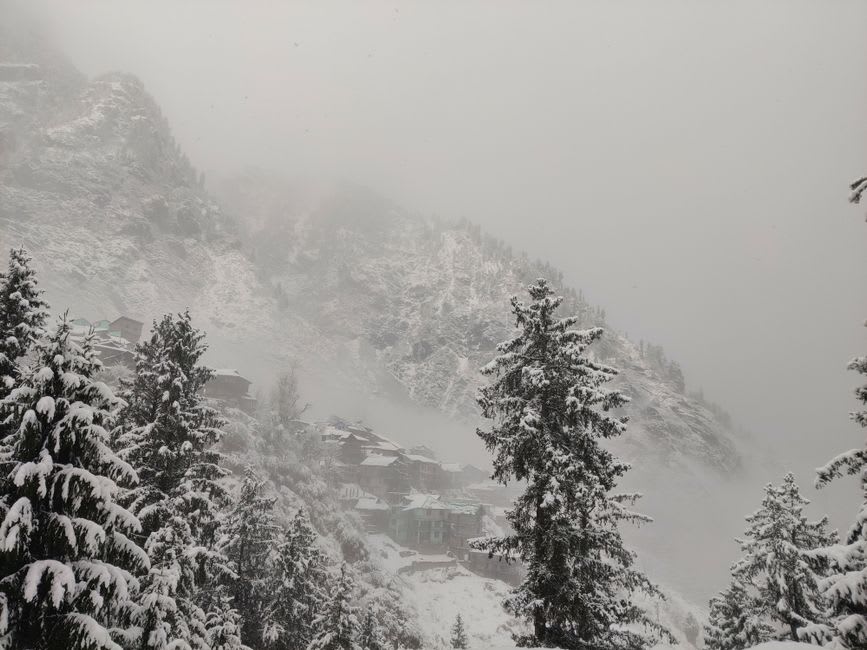 Traditional carved wooden houses in the isolated ridge village of Malana above the Parvati valley
